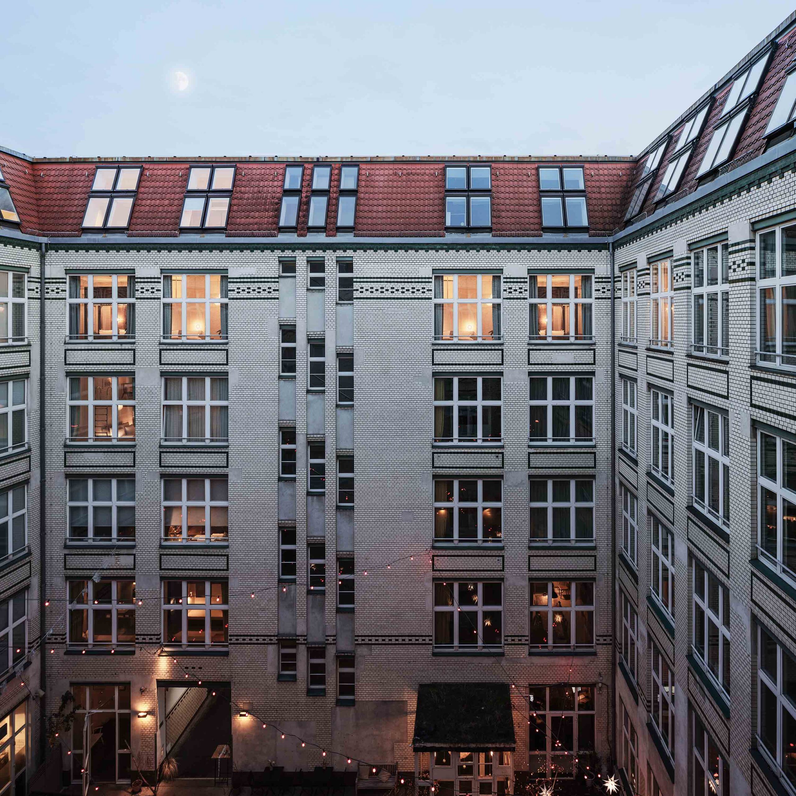 The planted courtyard between the old factory blocks, Michelberger Hotel