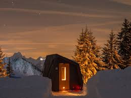 Snow domes grouped on the open mountain slope, Iglu-Dorf